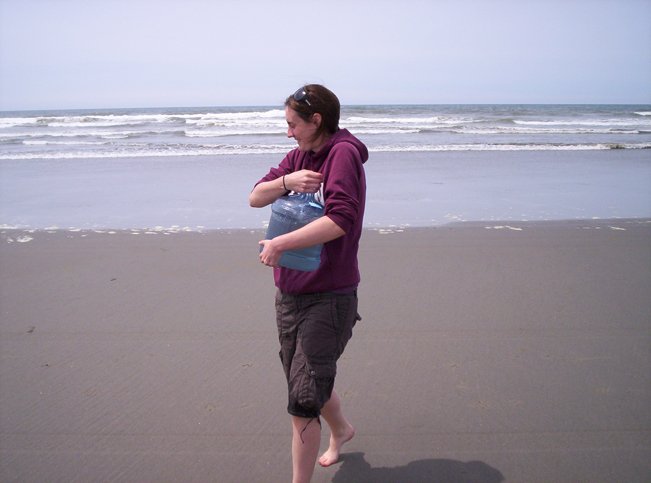 Michelle carrying a water sample