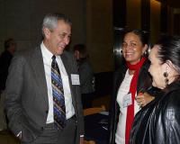 Parker greets guest at reception